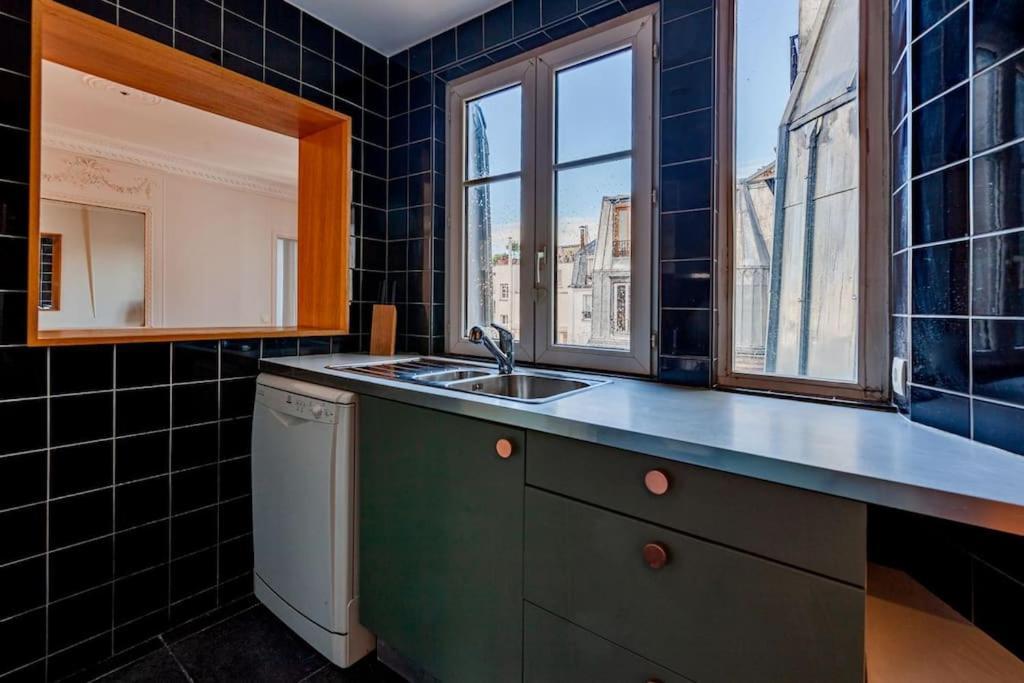 Charmant Appartement Au Coeur De Paris Exterior foto